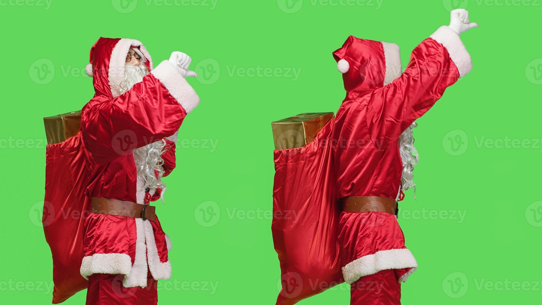 Negative character gives thumbs down expressing disappointment against greenscreen, carry bag full of presents on christmas eve. Displeased santa showing dislike disapproval sign. photo