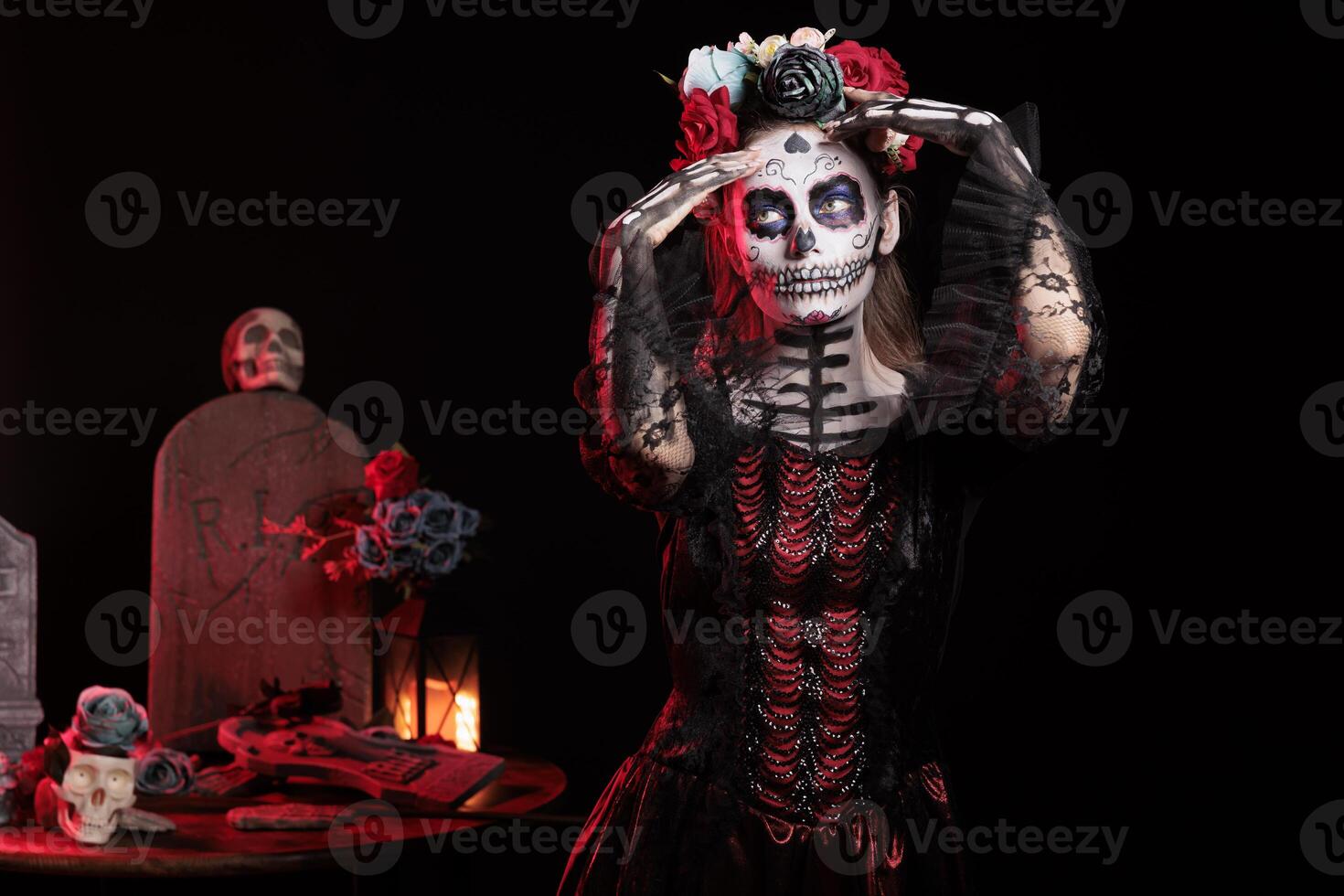 Woman with traditional attire at Day of the Dead event to remember the deceased, celebrating their memory. Lady wearing elegant silk dress for Mexican holiday of remembrance for those who have passed photo