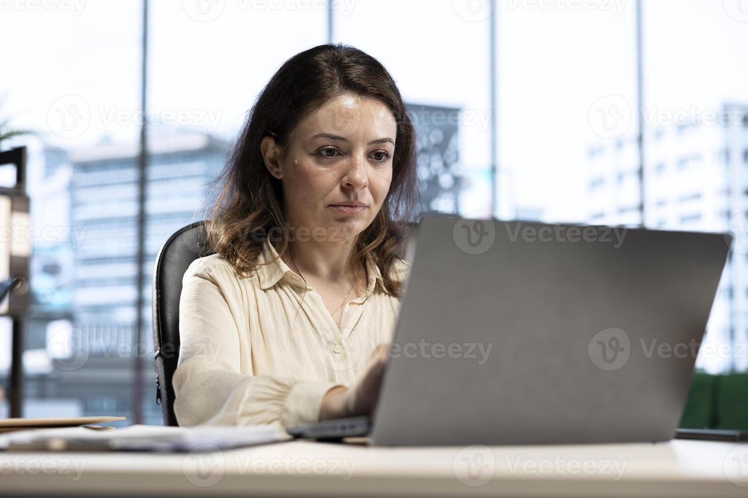 Professional goal oriented CEO analyzing global trends in high end office, planning the next steps for expansion and investment opportunities. Emphasizing executive power and work ethic. photo