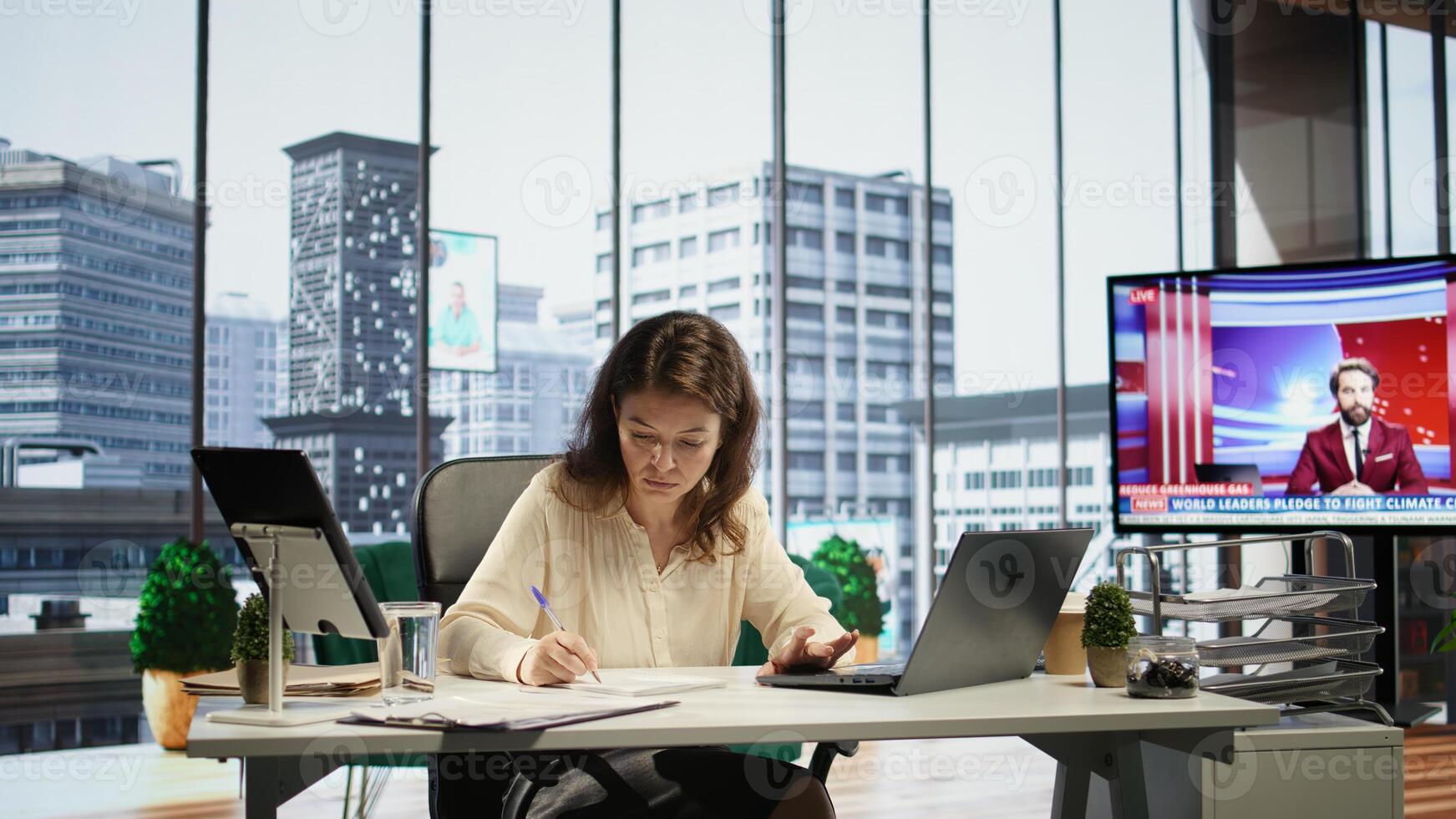Female leader with executive power signing work contracts and approving employees requests, daily paperwork tasks for productivity. Authorization for leave request or license agreement. Camera B. photo