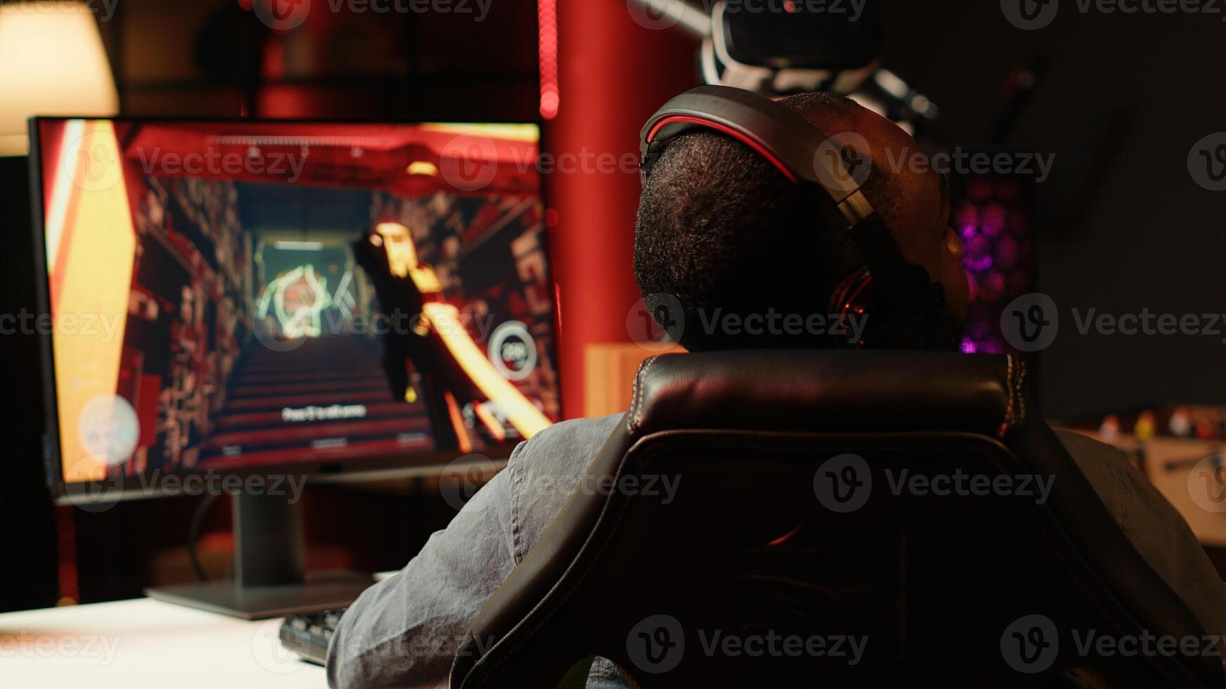 Pro gamer in studio teaching subscribers strategies to beat foes during livestream. Man streaming live from RGB lit living room, recording videogames esports guide for internet audience photo