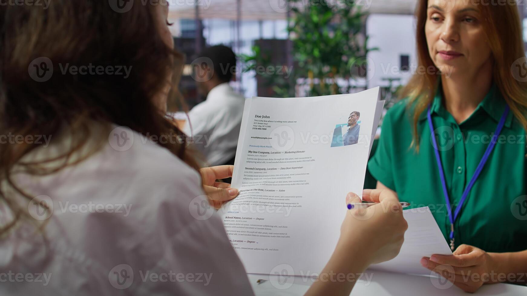HR employers analyzing candidate CV after the job interview, carefully evaluating all qualifications and business administration knowledge or experience. Selection process for employment. Camera B. photo