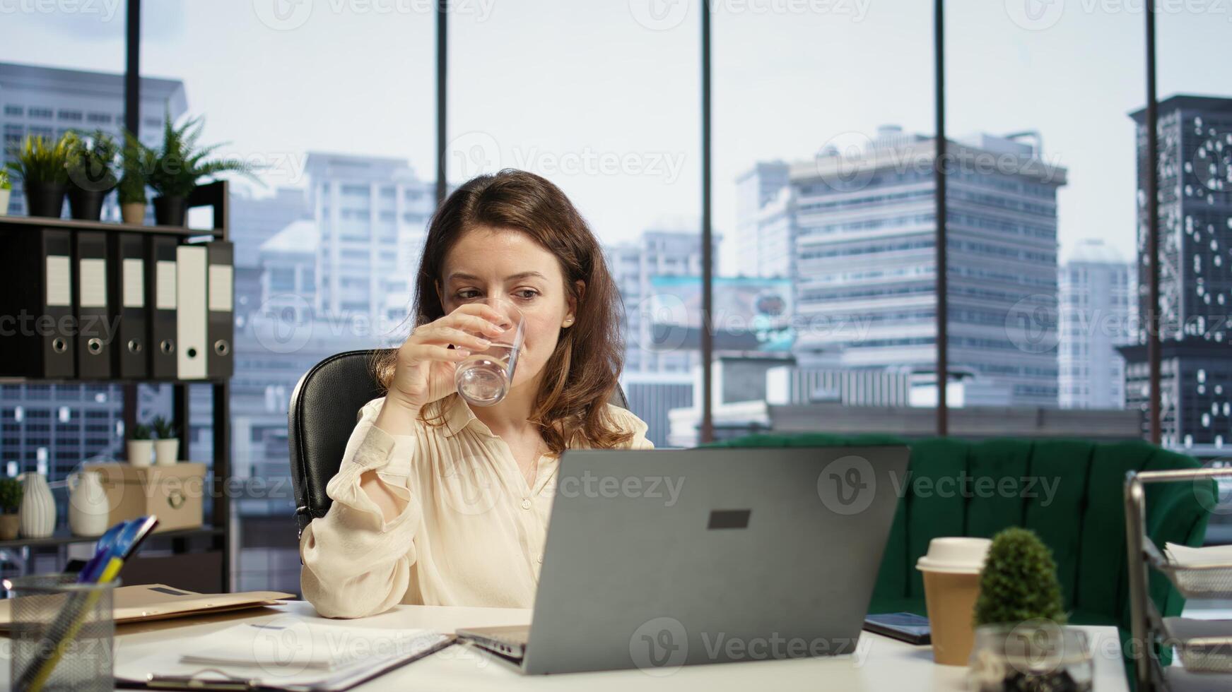 Empowered ambitious female CEO working on career development strategy, multitasking to increase enterprise profit. Decision making leadership skills for productivity and work ethic. Camera B. photo