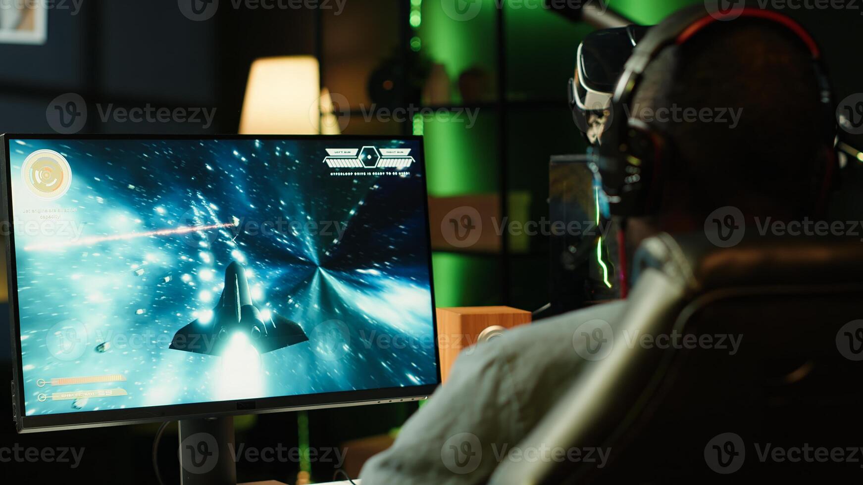 Man wearing headphones playing game, teaching subscribers professional esport skills, close up shot. Media star using headset mic to chat with viewers, filming gaming tutorial, camera A photo