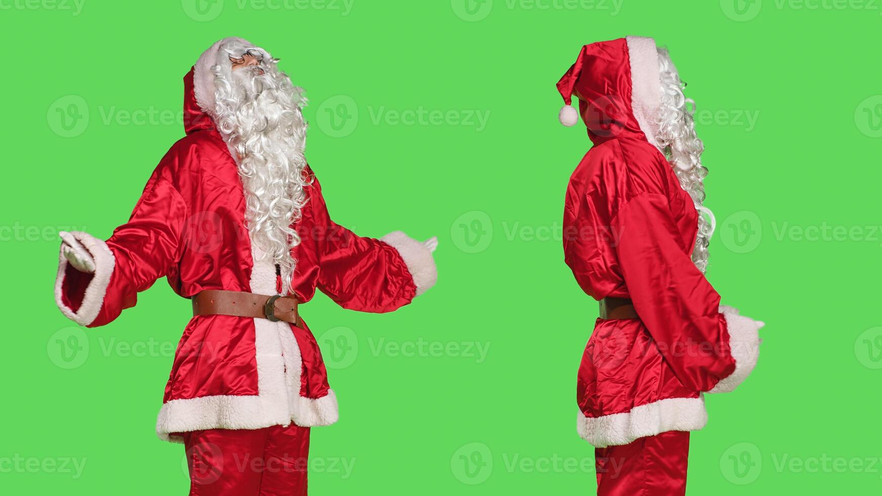 Uncertain saint nick acting clueless, doing i dont know symbol on camera while he wears christmas eve festive costume. Santa claus character being unsure about answer, doubtful person. photo