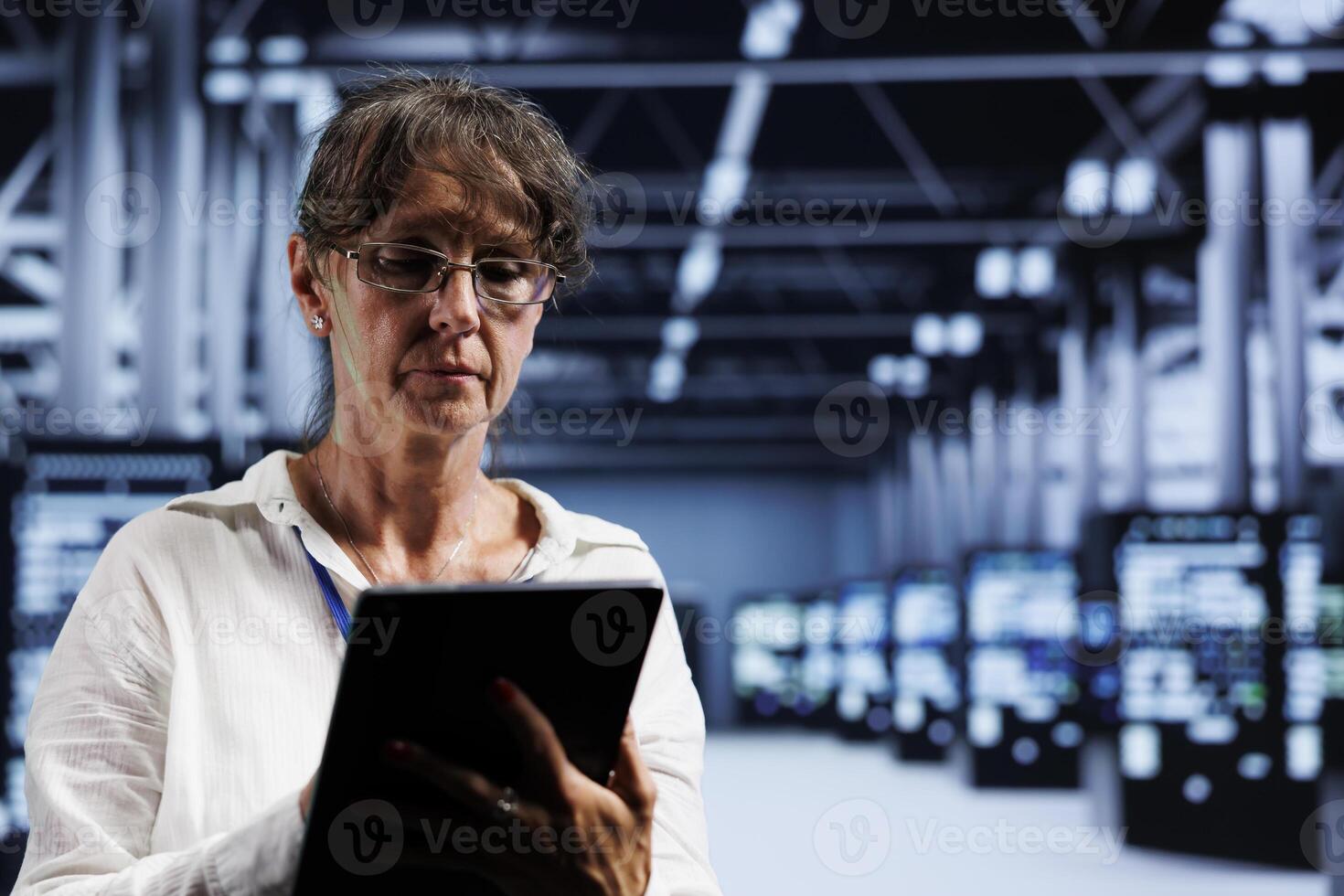 Manager overseeing high tech business providing computing resources needed for AI to process extensive datasets for training. Server infrastructure storing datasets used for machine learning photo