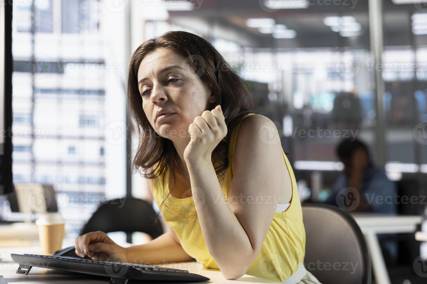 Tired developer feeling sleepy while fixing applications issues, dealing with server configurations. IT expert struggling to stay awake after pulling all nighter while optimizing company software photo