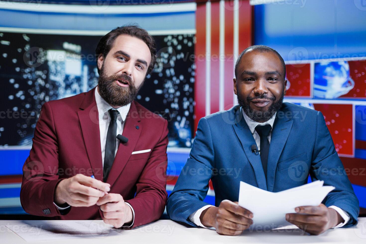Diverse journalists live on talk show, broadcasting latest breaking news with exclusive details and information. Team of presenters discussing international events, covering all topics on tv network. photo