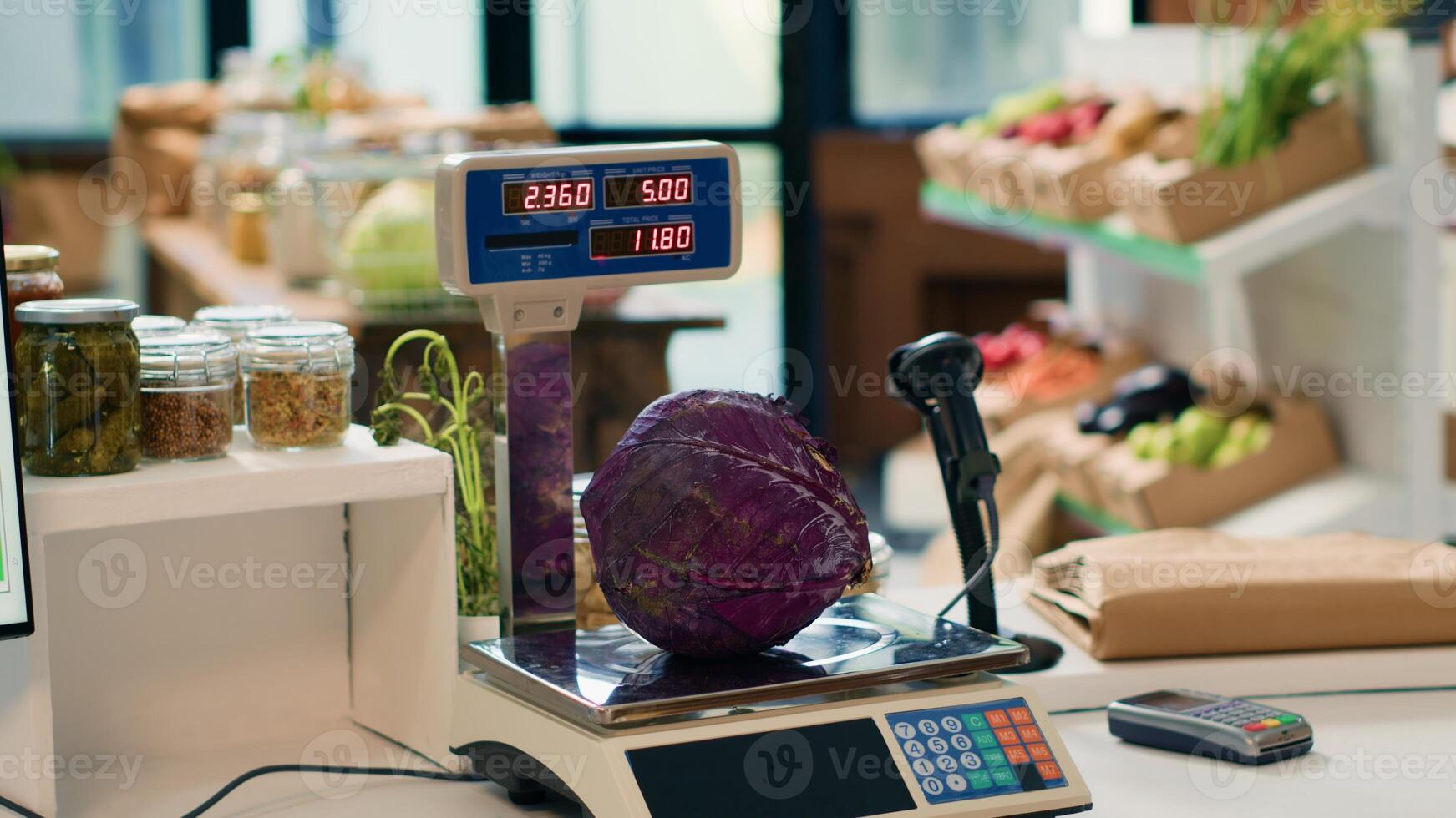 Electronic scale in zero waste eco store used to weight organic produce created without industrial solvents or synthetic food additives. Weighing machine in local grocery supermarket. photo