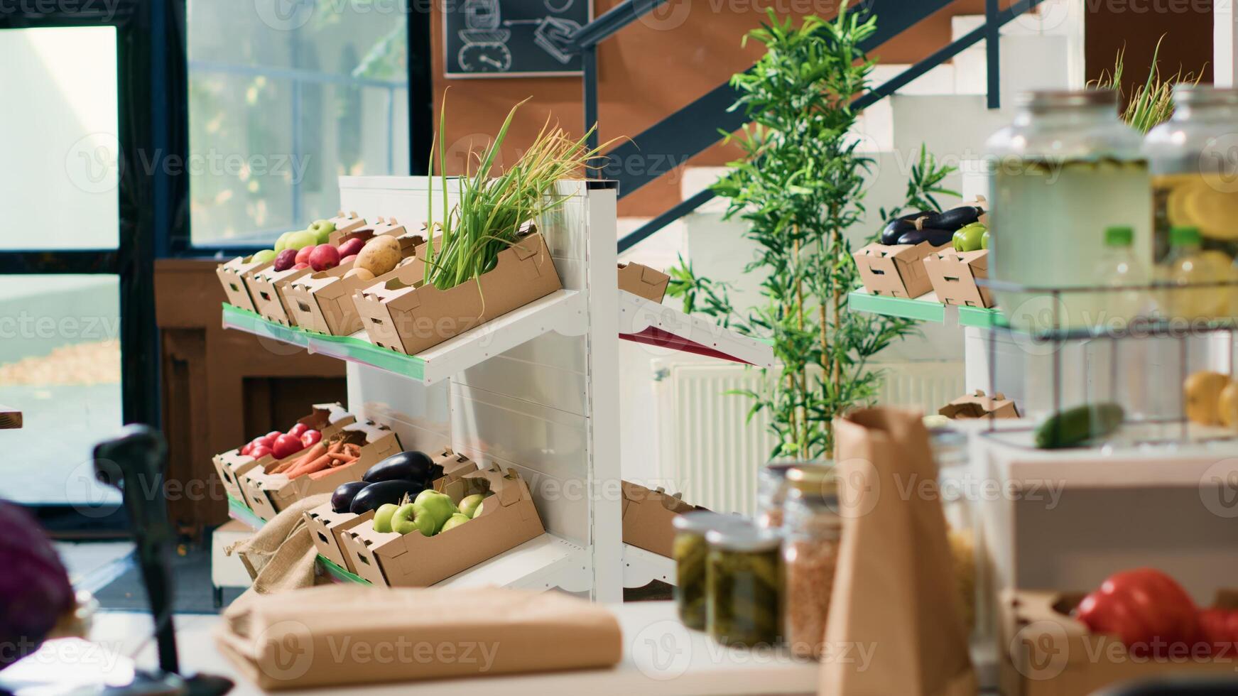 Eco friendly zero waste supermarket selling nonpolluting local organic produce, advertising healthy lifestyle. Empty grocery store having locally grown sustainable fruits, vegetables and herbs. photo