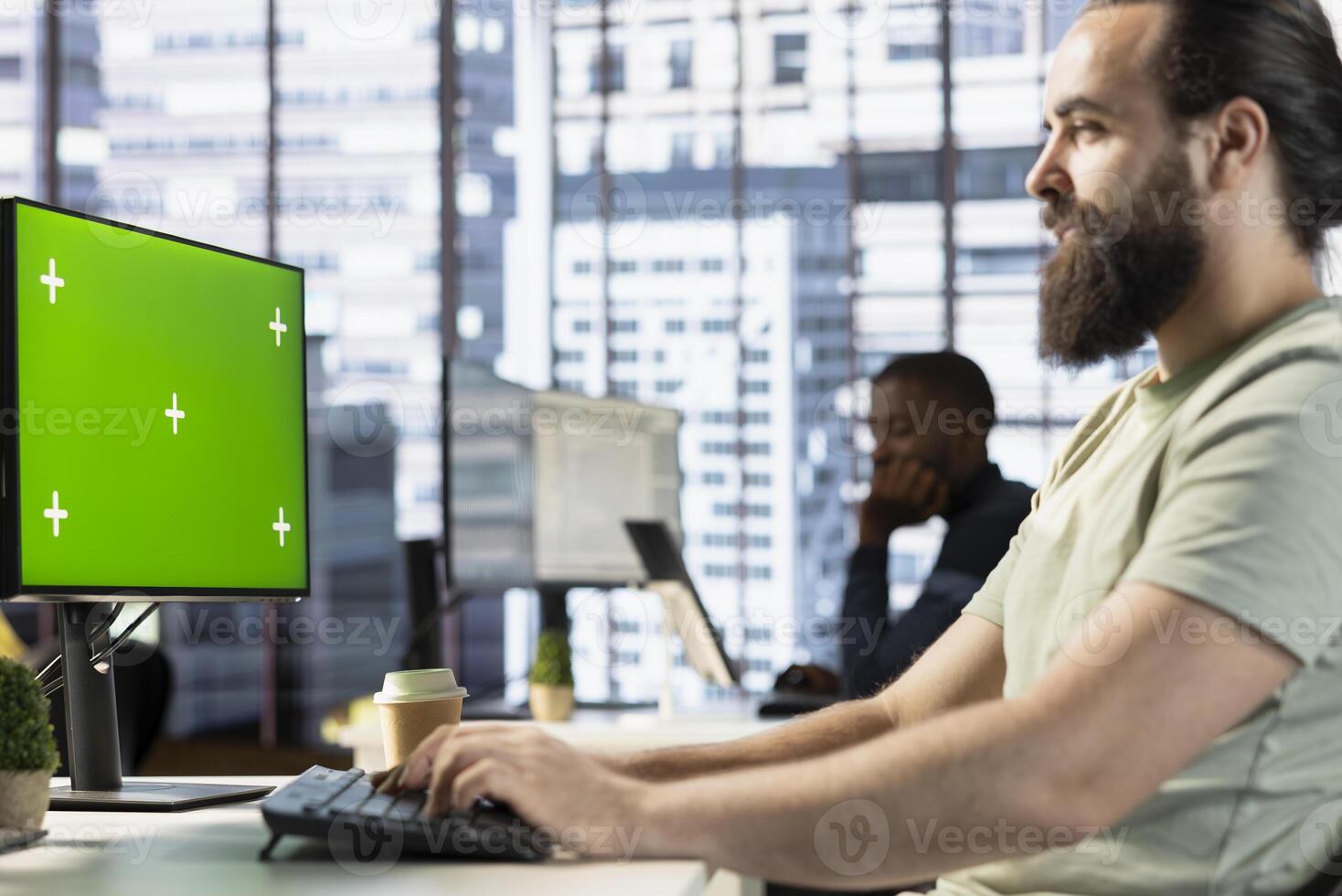 Smiling programmer using isolated screen PC to create machine learning models that can process data to automate decision making processes. Happy IT specialist programming using mockup computer photo