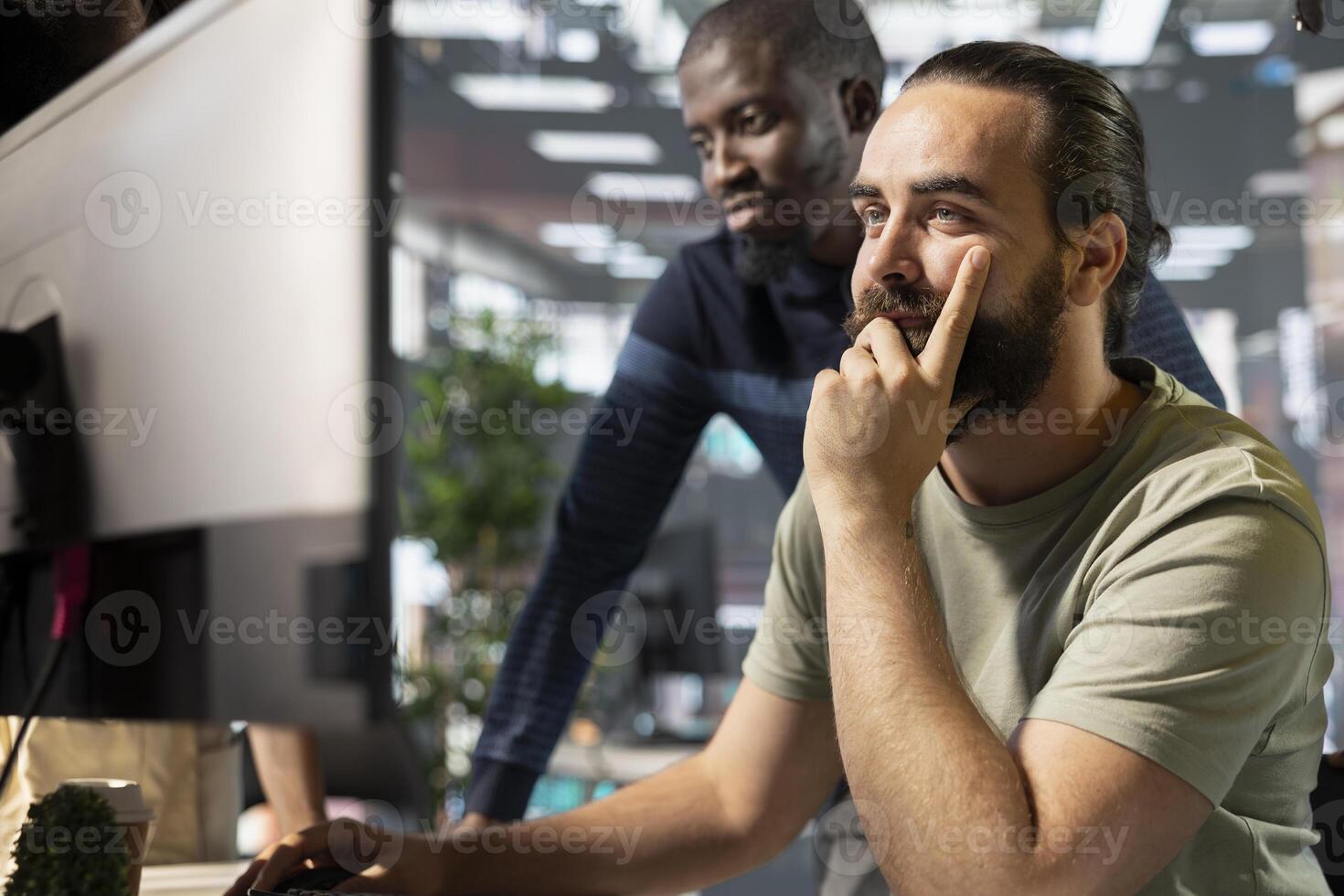 Teamworking accountants checking company document figures and stats for accuracy during job shift. Coworkers doing business tasks, crosschecking financial information in office photo