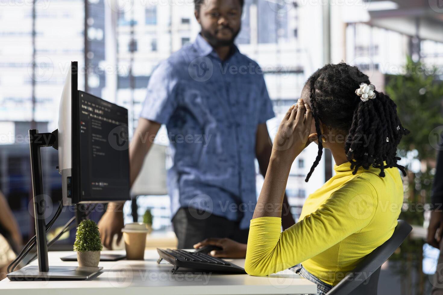 Programmer doing software debugging, asking for help from coworker, checking errors in lines of code. Employee fixing coding mistakes, being assisted by colleague sharing helpful advice photo