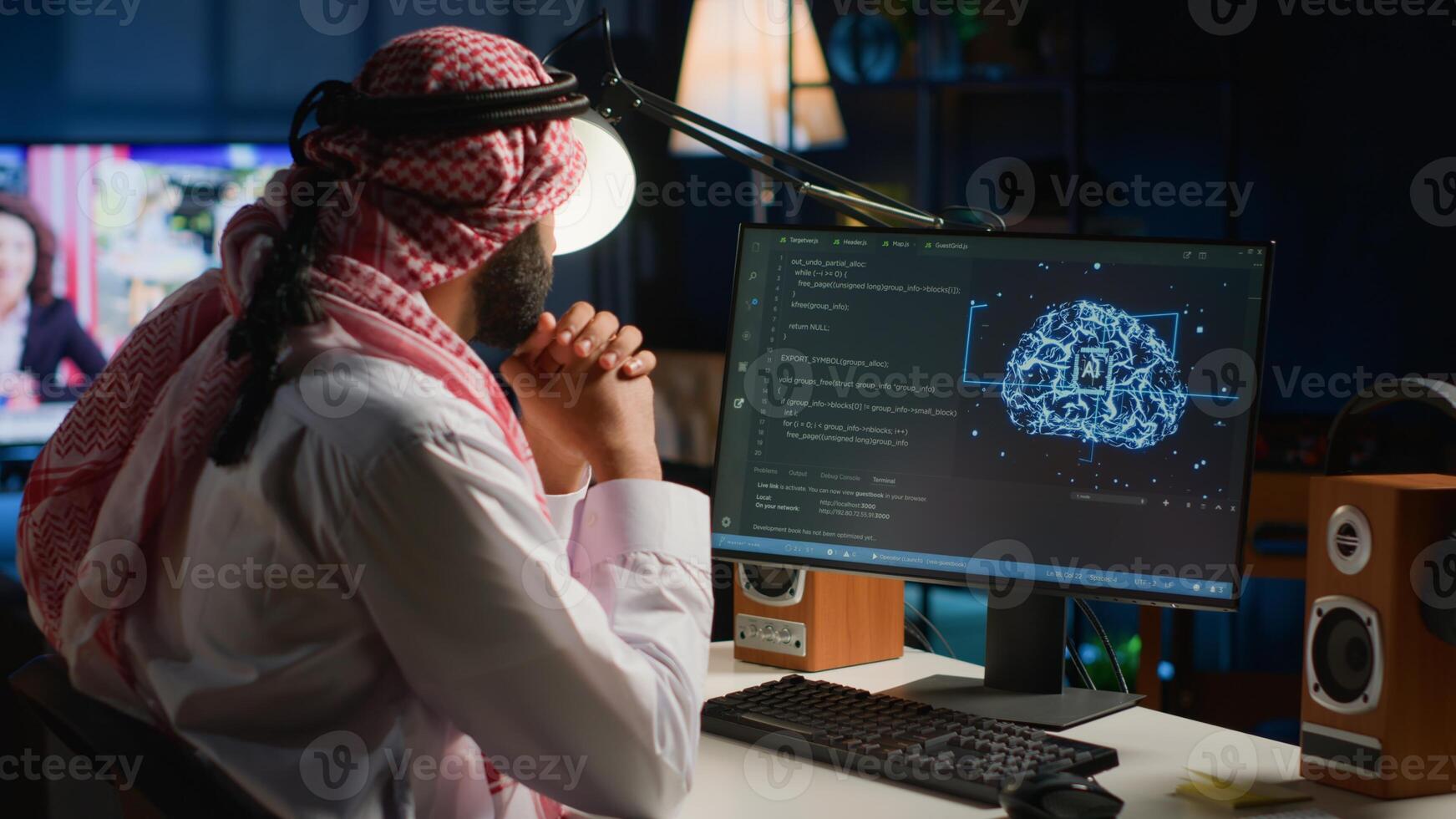 Arab admin using computer to visualize artificial intelligence neural networks made up of interconnected nodes using augmented reality technology. Developer oversees AI systems processing information photo