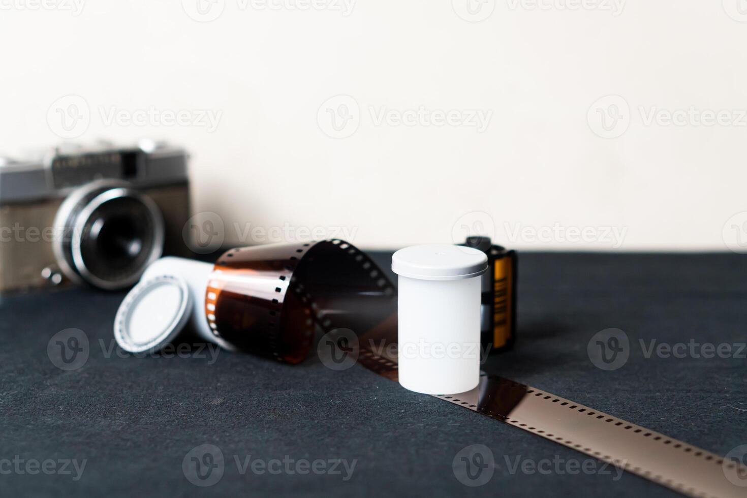 Vintage Camera with Film Roll and Canister photo
