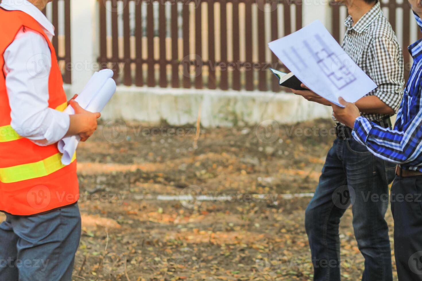 A team of engineers and architects joined together to enter the construction area to check the construction progress according to the plans that the team of engineers and designers had set out. photo