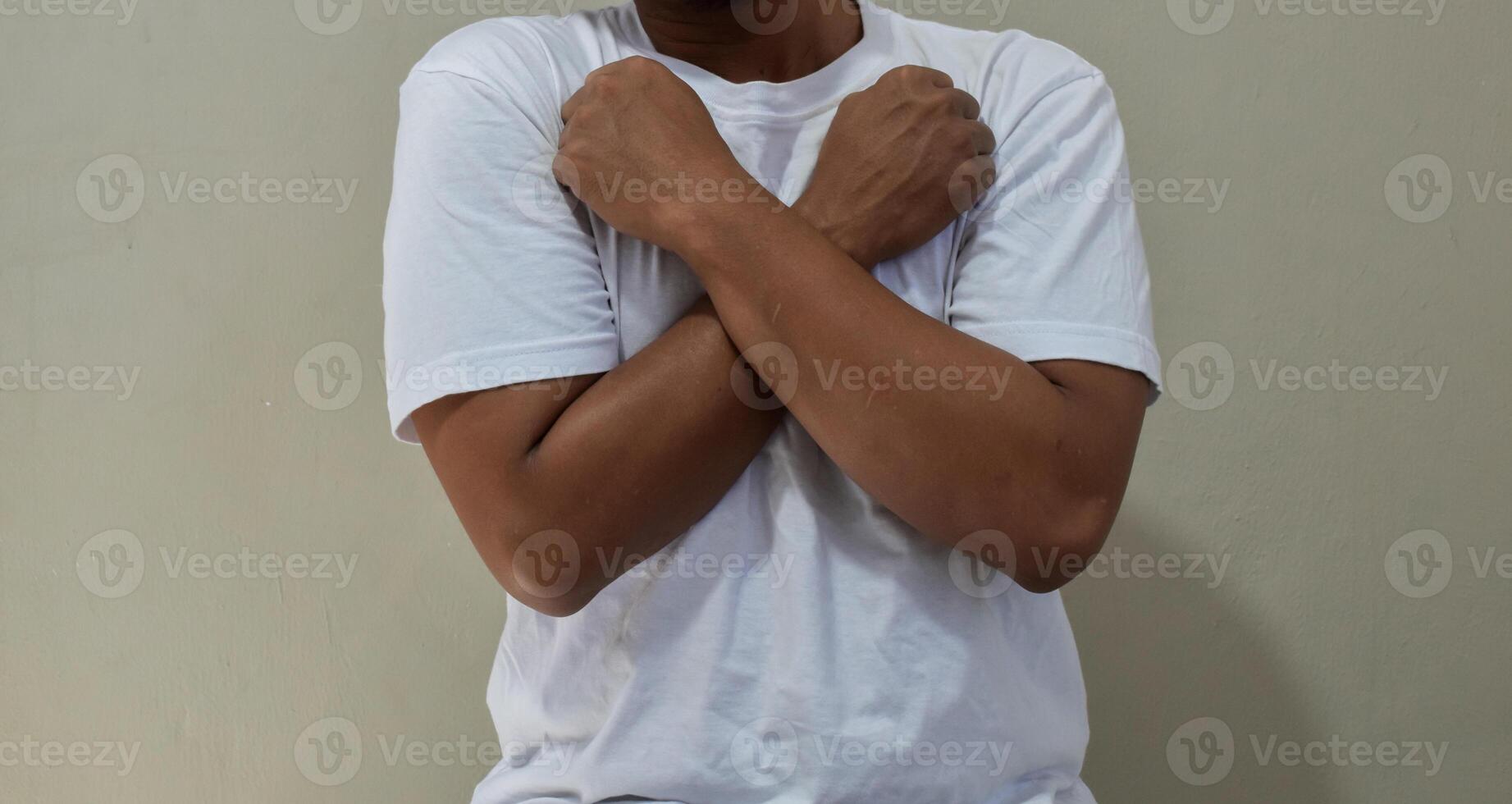 Young man saying love you in sign language, communication for deaf photo