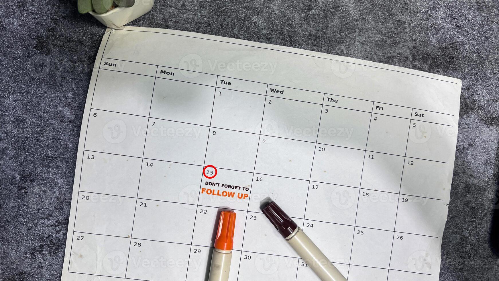 Don't Forget to Follow Up text white calendar background. Reminder or schedule concept photo