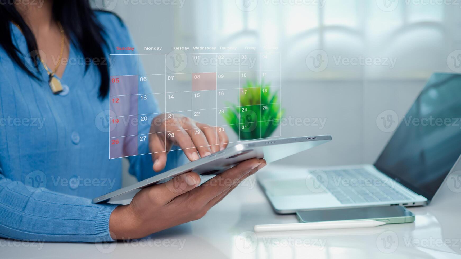 Businesswoman marking dates on virtual calendar with tablet, Managing his business schedule, Setting reminders for important appointments, creative collage for planning ideas, Appointment scheduler. photo