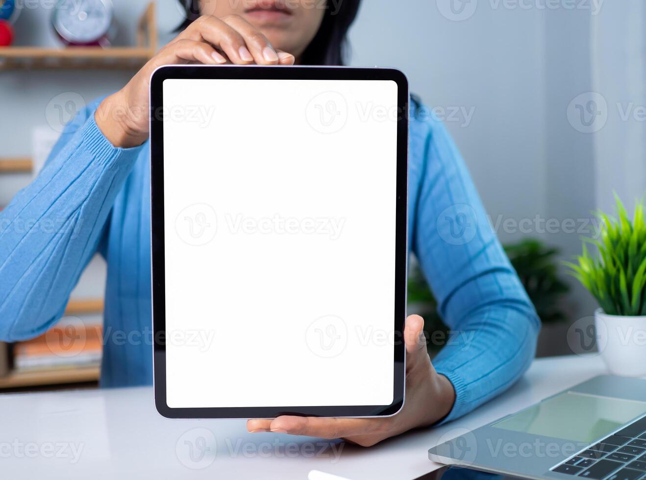 Businesswoman hand holding tablet with white empty screen in hand, Smartphone mockup for online shopping, Online education or online business with copy space, Presentation and advertising concept, photo