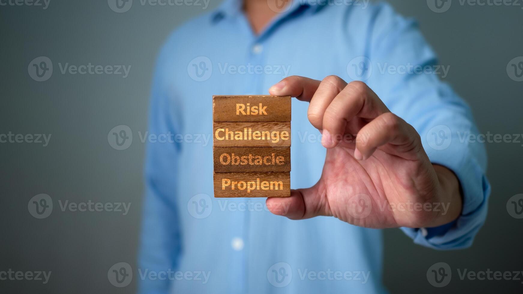 Human hand holding wood blocks in risk management concept, Challenge, Obstacle, Financial risk management concept ,Business Investment Feasibility Assessment, Business risk analysis. photo