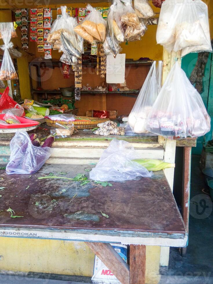 Indonesian traditional market. with various merchandise ready to be purchased photo