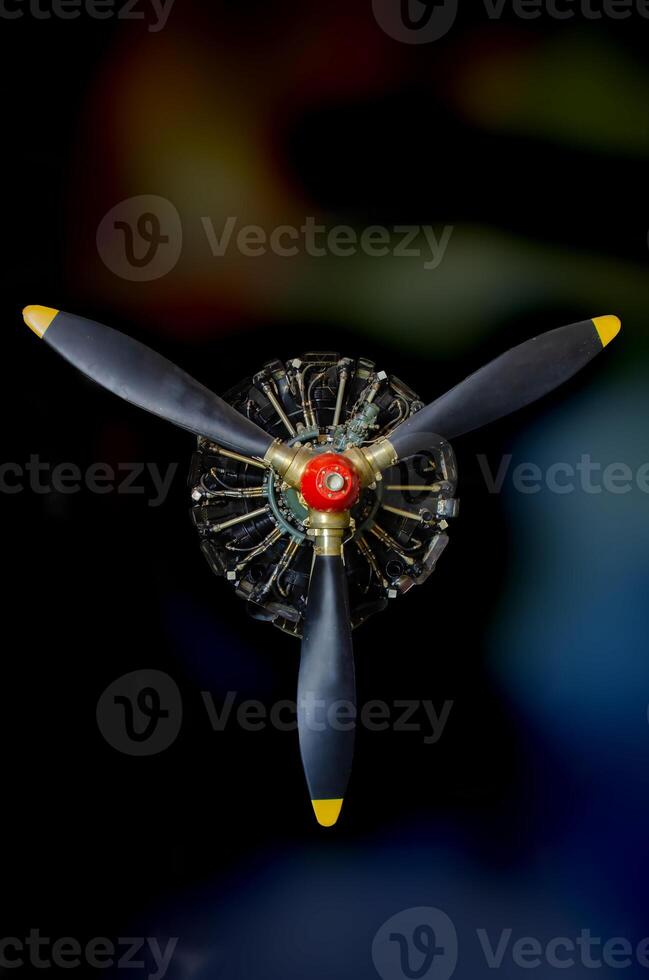 detail of old airplane engine with propeller photo