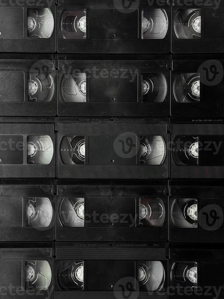 Retro black vhs tape collection capturing vintage analog nostalgia photo