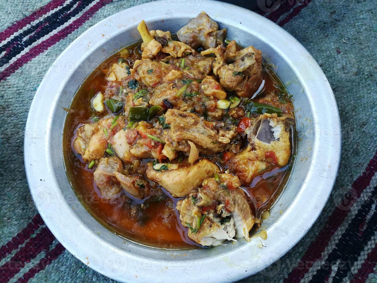 Mutton and chicken are versatile proteins used in a variety of dishes. Mutton delivers rich flavors for curries and stews, while chicken is tender and great for grilling or roasting. Both are seasoned photo