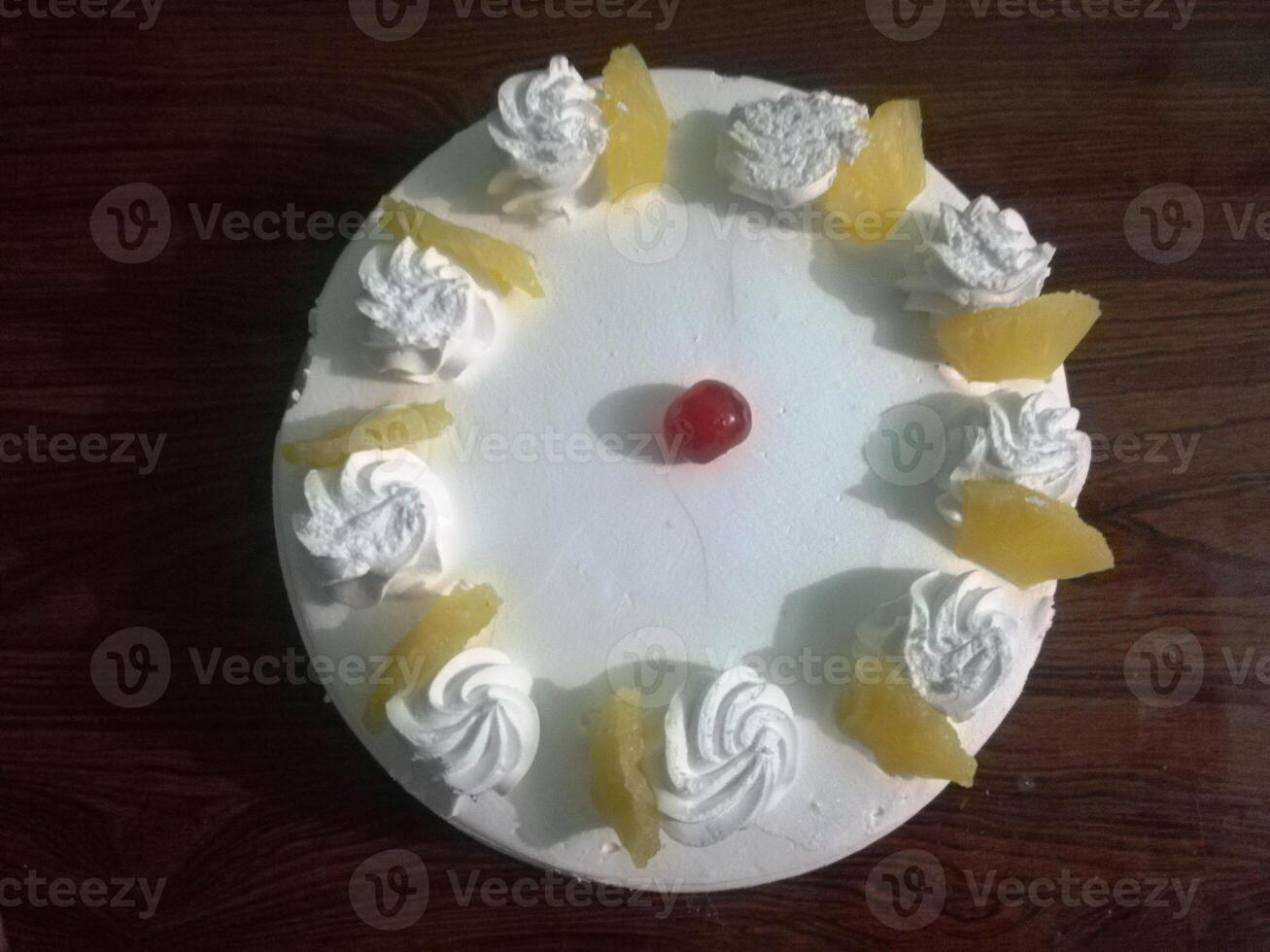 A delightful spread of cakes, sweets, and desserts showcases an array of flavors and textures. From rich chocolate cakes to delicate pastries, each treat is beautifully crafted. photo