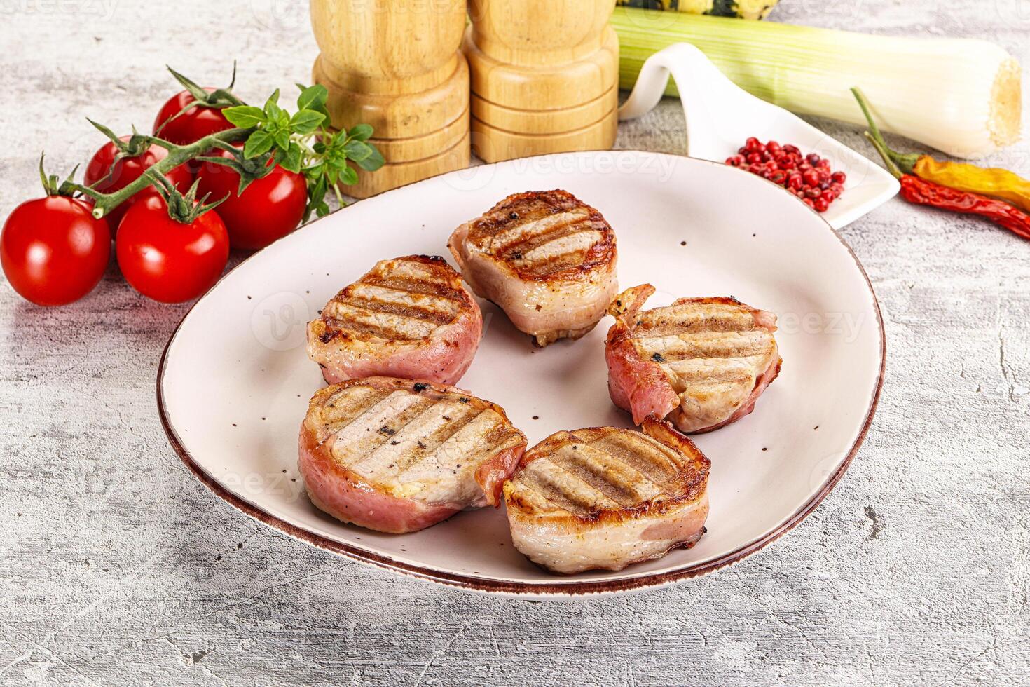 Grilled pork tenderloin with bacon photo