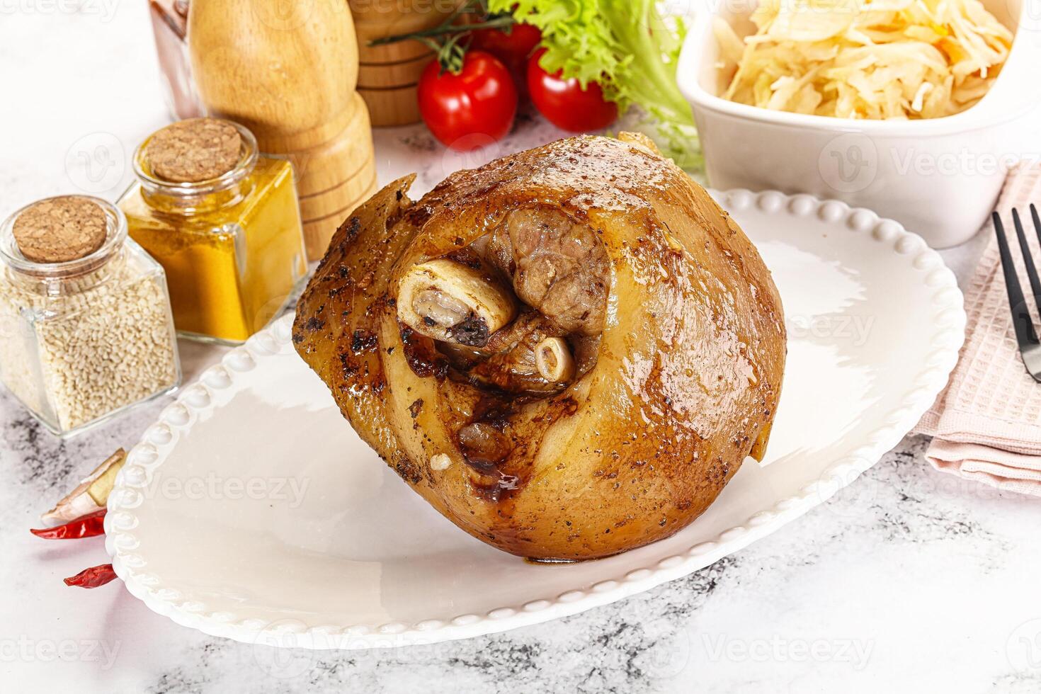 Baked pork knee with spices photo