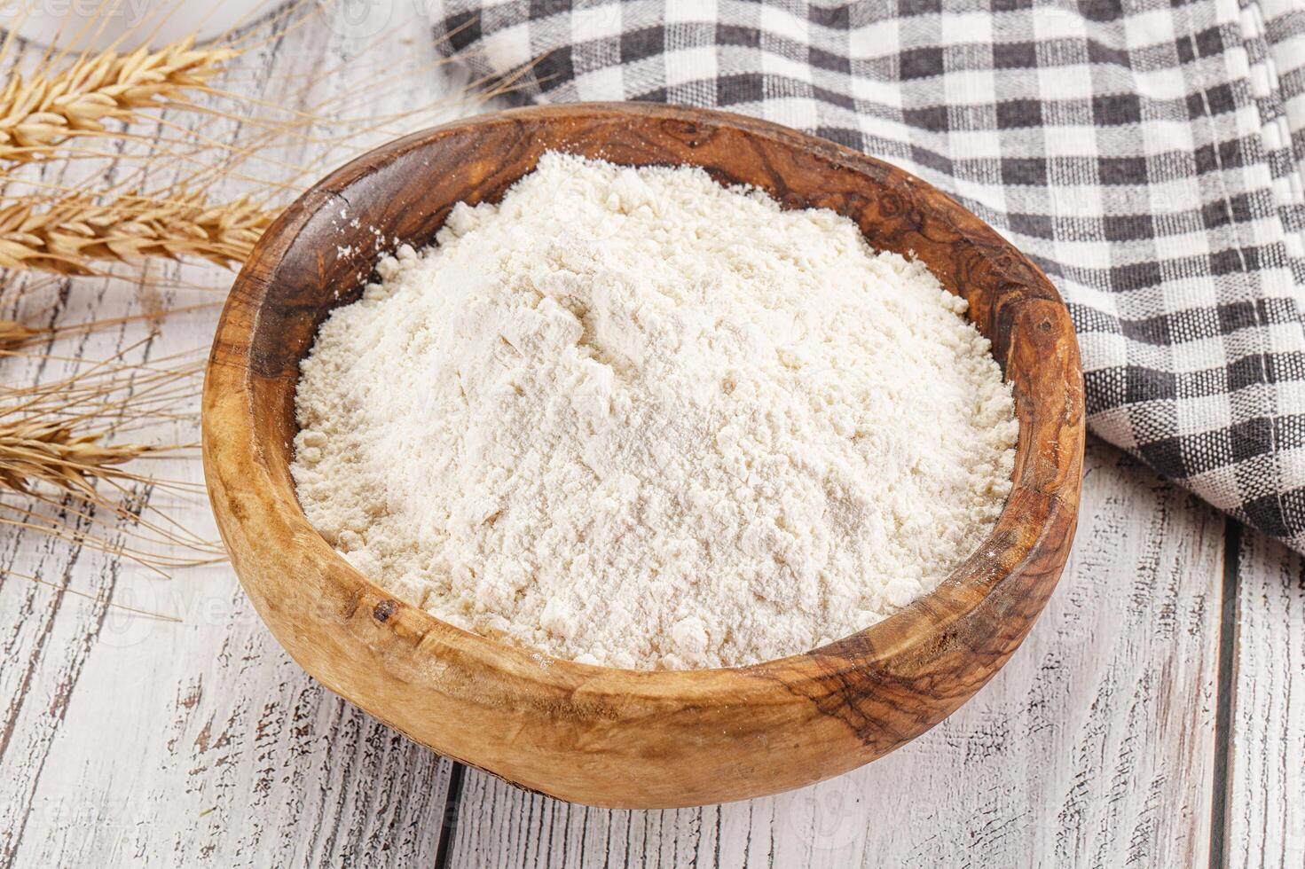 Wheat flour heap for bake photo