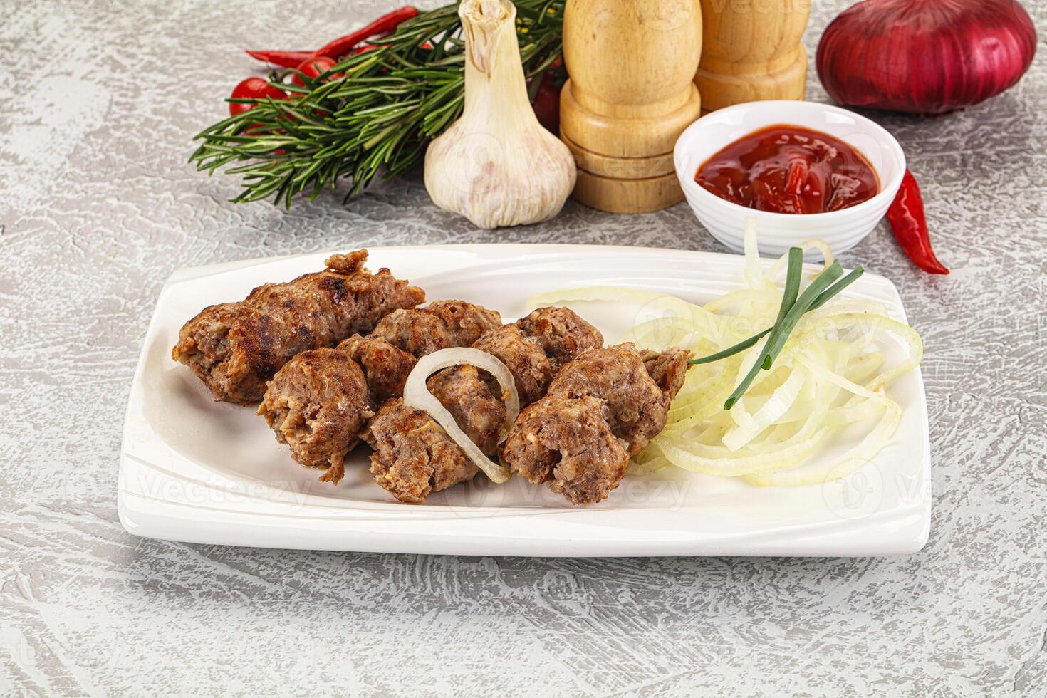 Beef kebab minced meat with onion photo