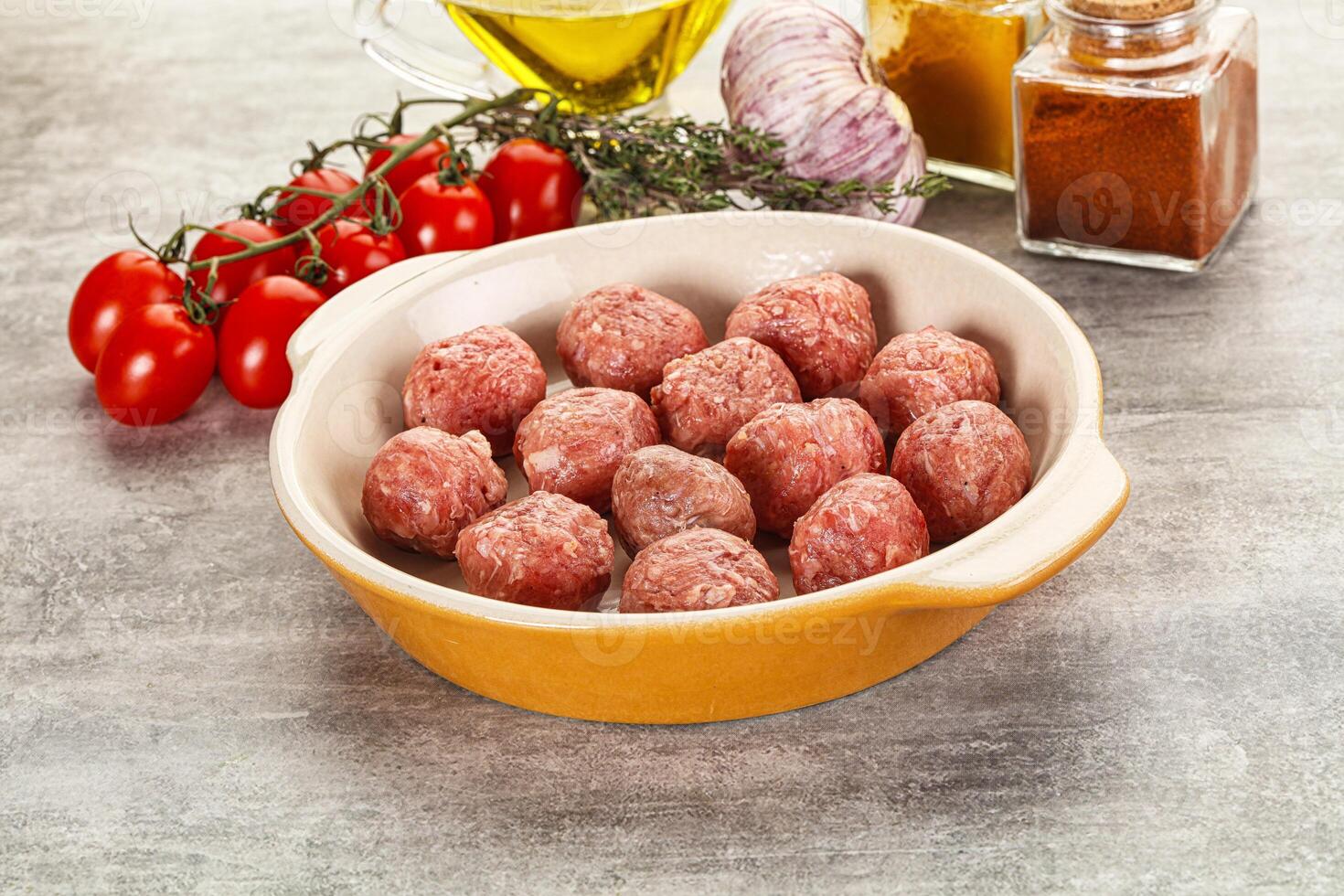 Uncooked raw beef meatball minced photo
