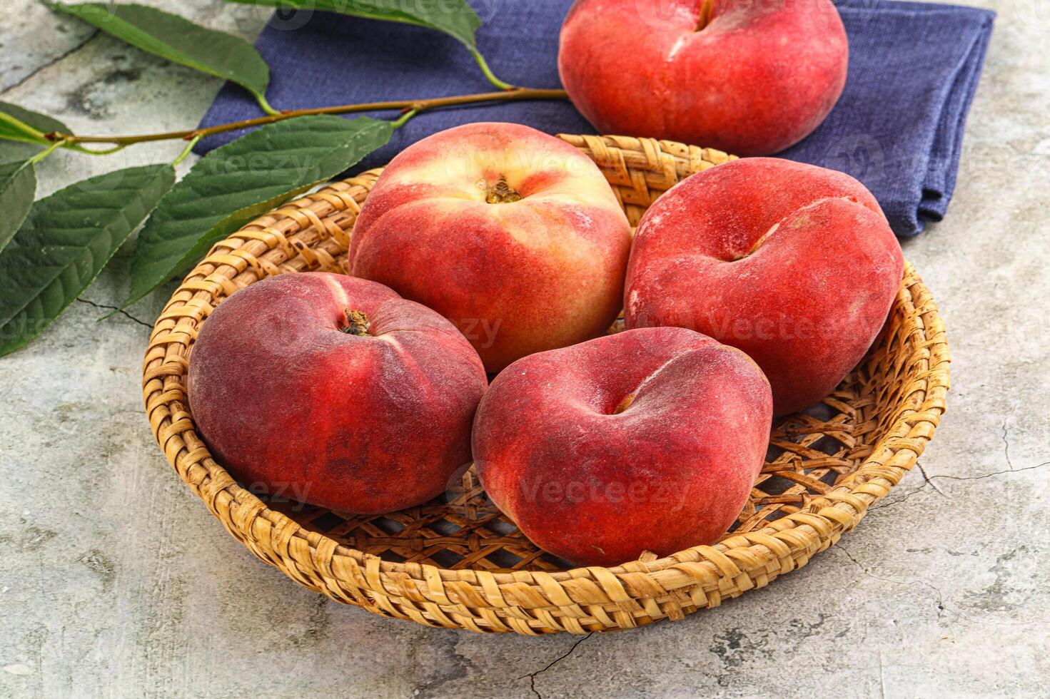 Ripe sweet and juicy Flat peach photo