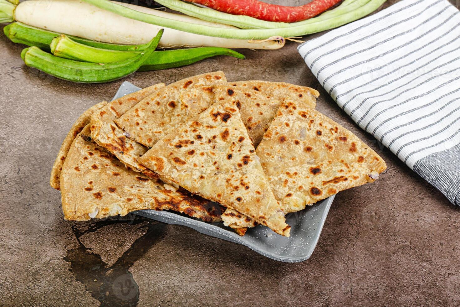 Indian Aloo Paratha - bread with potato photo
