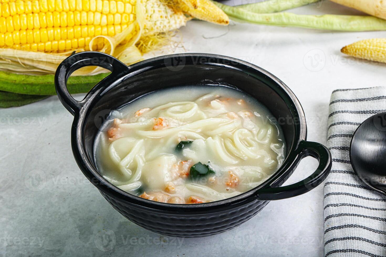 Soup with prawn and noodle photo