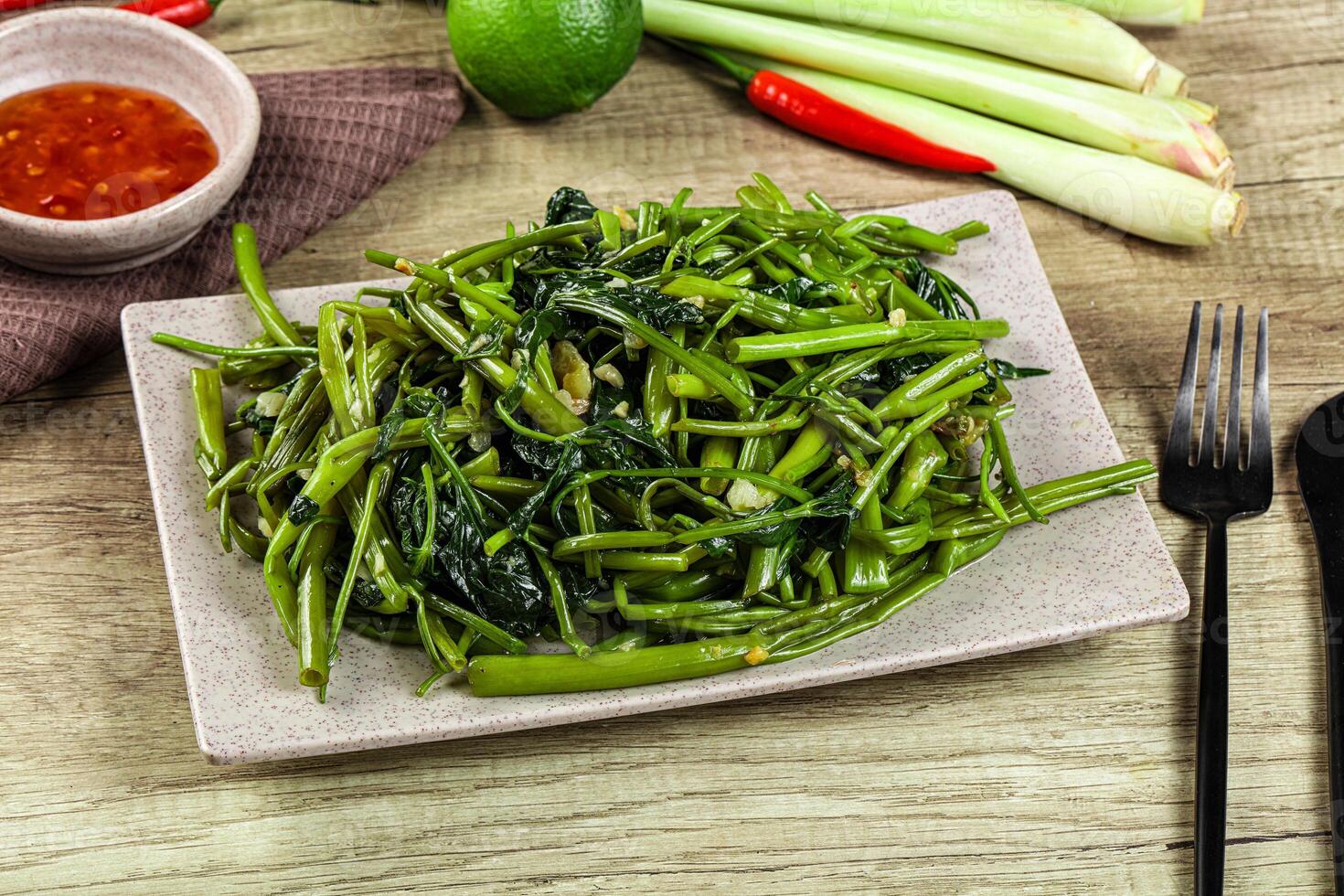 Asian cuisine stir fried morning glory photo