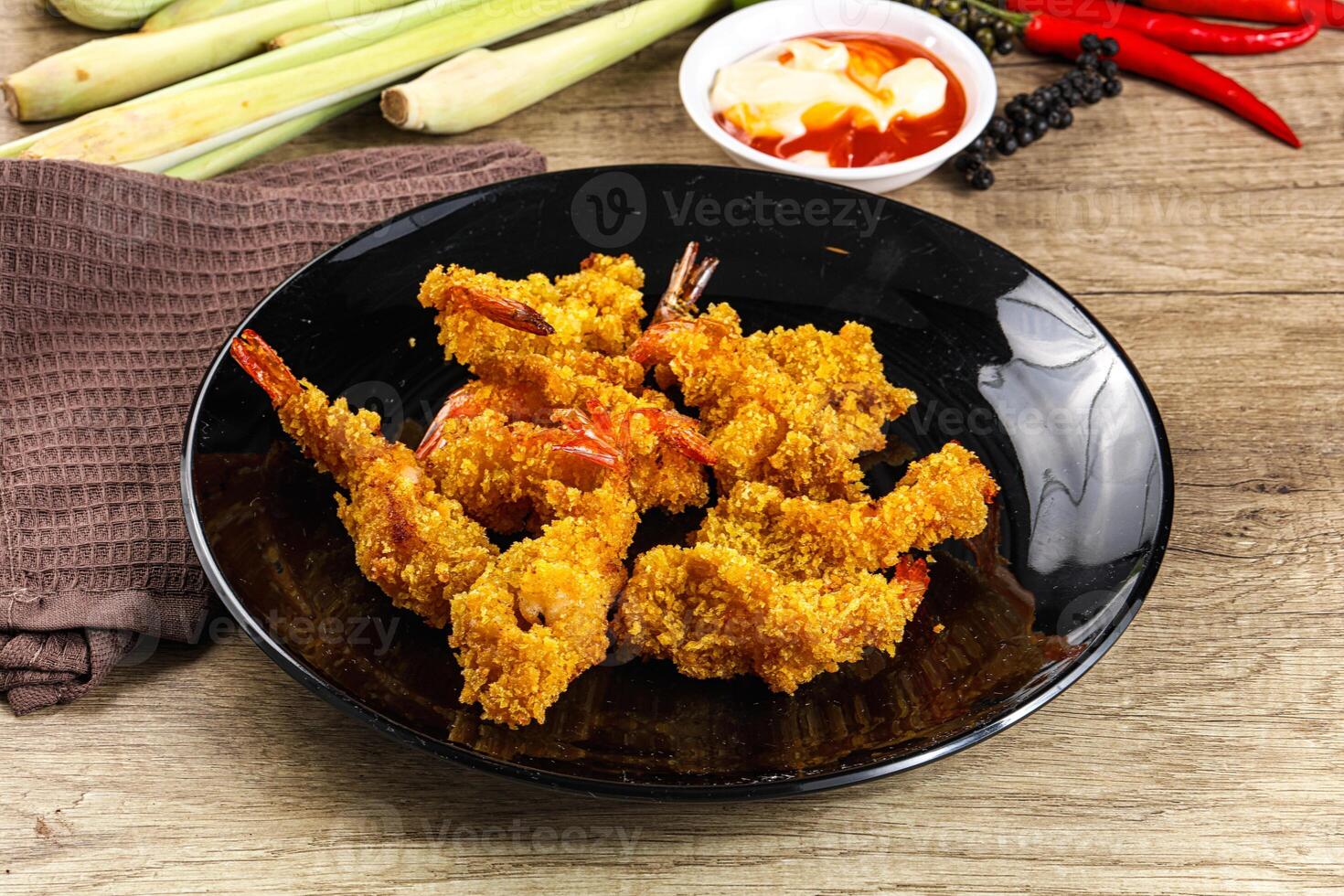 Golden deep prawn tempura wuth sauce photo