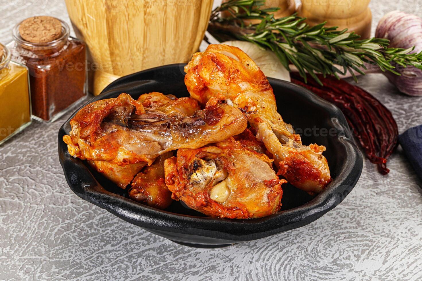 Raw marinated chicken drumstick for cooking photo