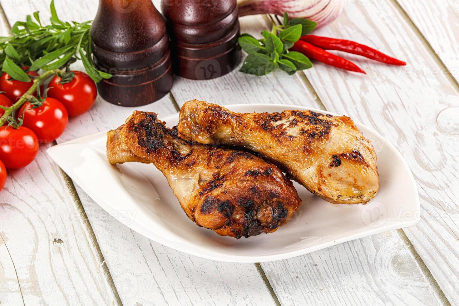 Hot and tasty chicken drumstick barbecue photo