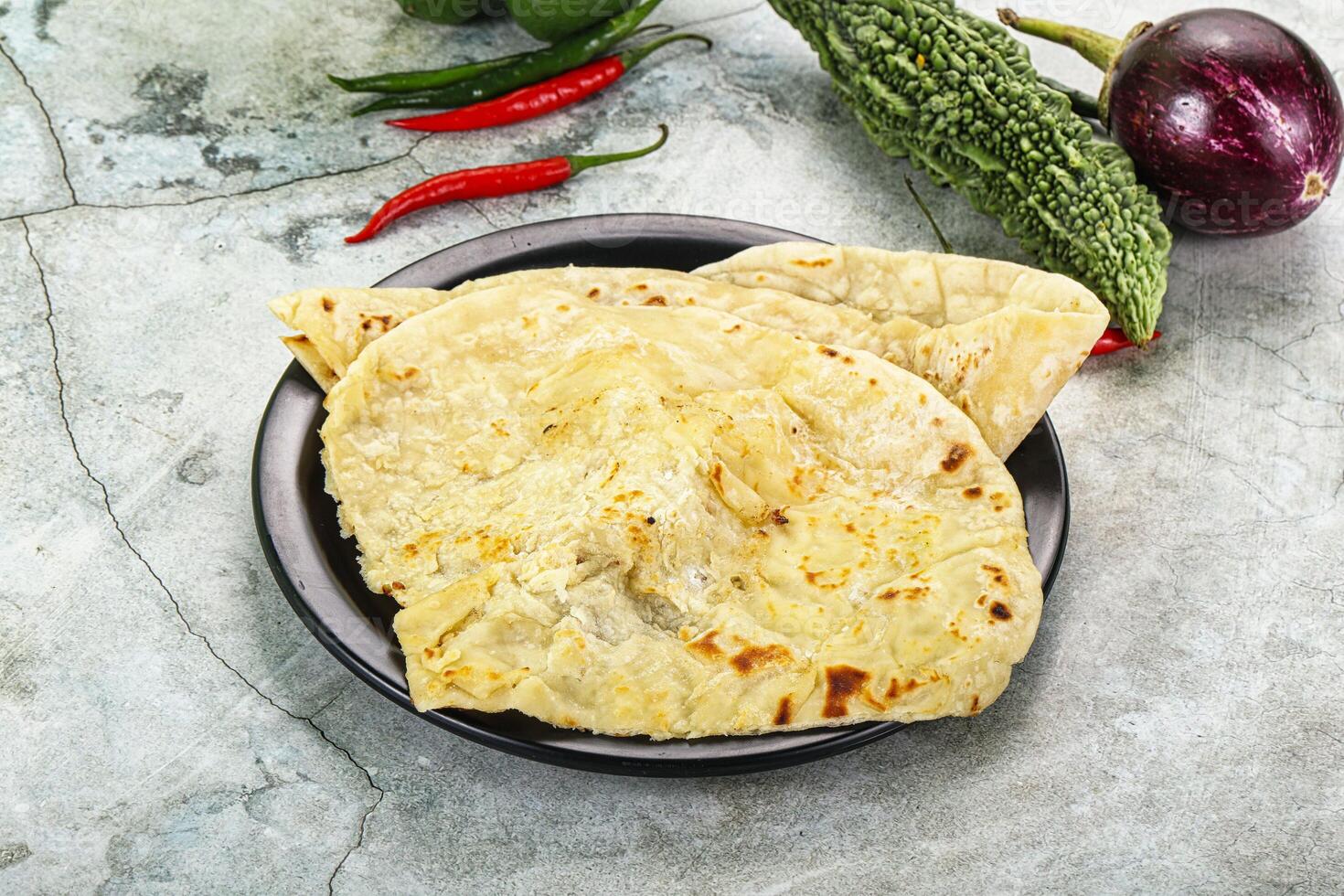 Indian tandori bread - naan with cheese photo