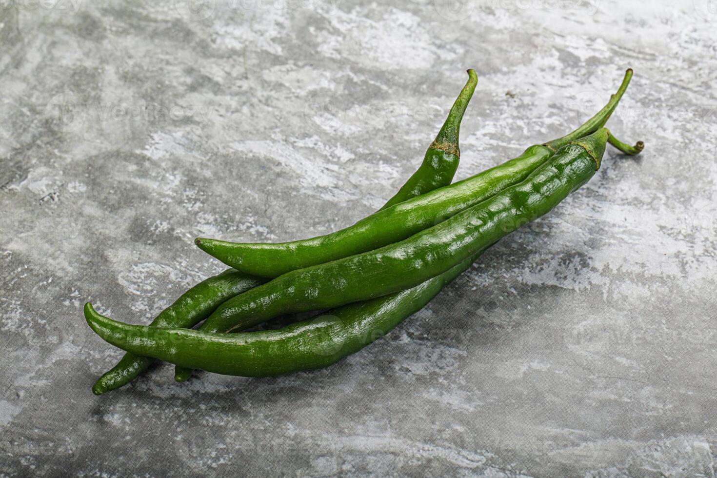 Hot and spicy green chili pepper photo