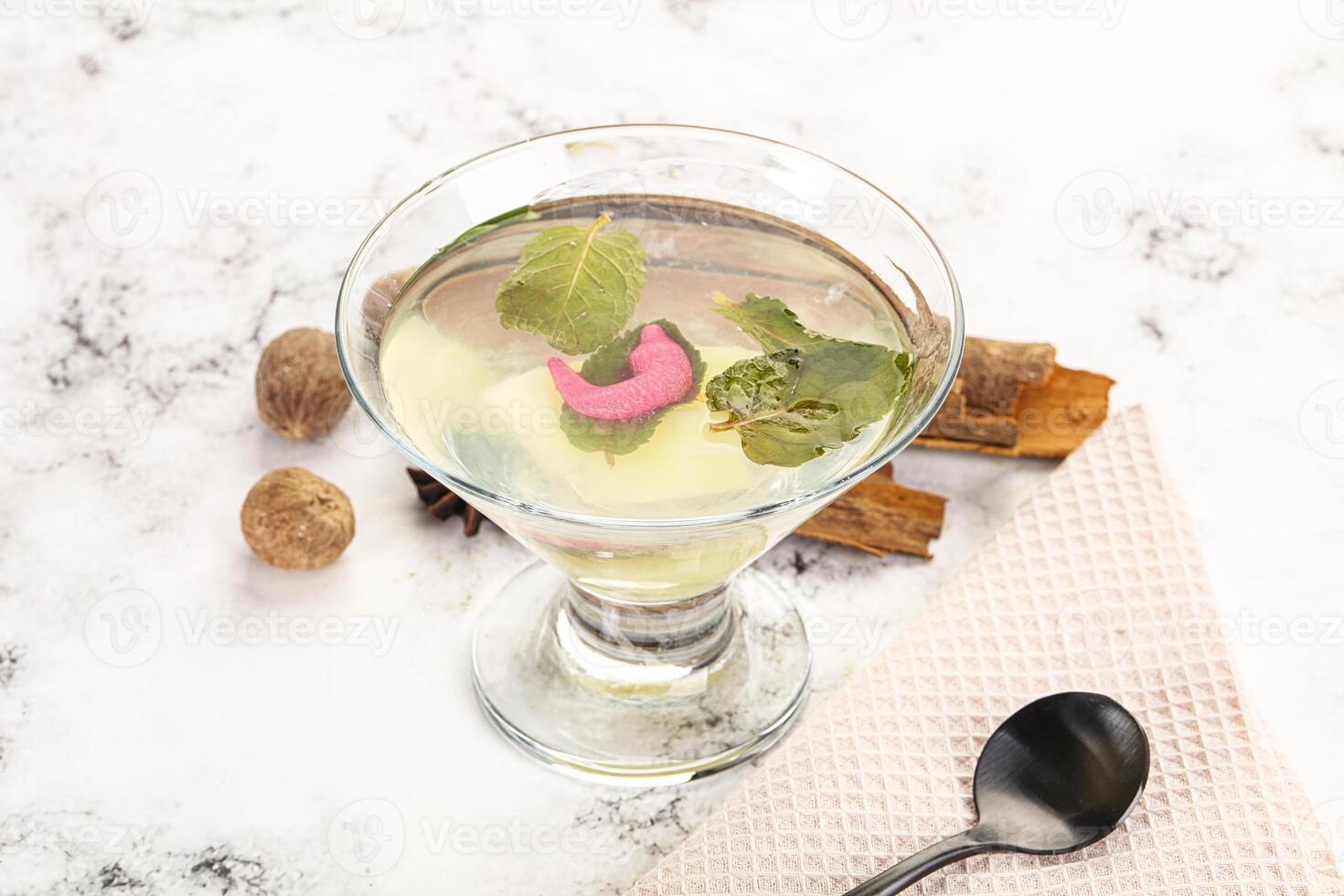 Sweet pineapple jelly with mint photo