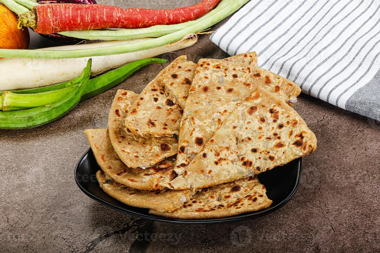 Indian Aloo Paratha - bread with potato photo