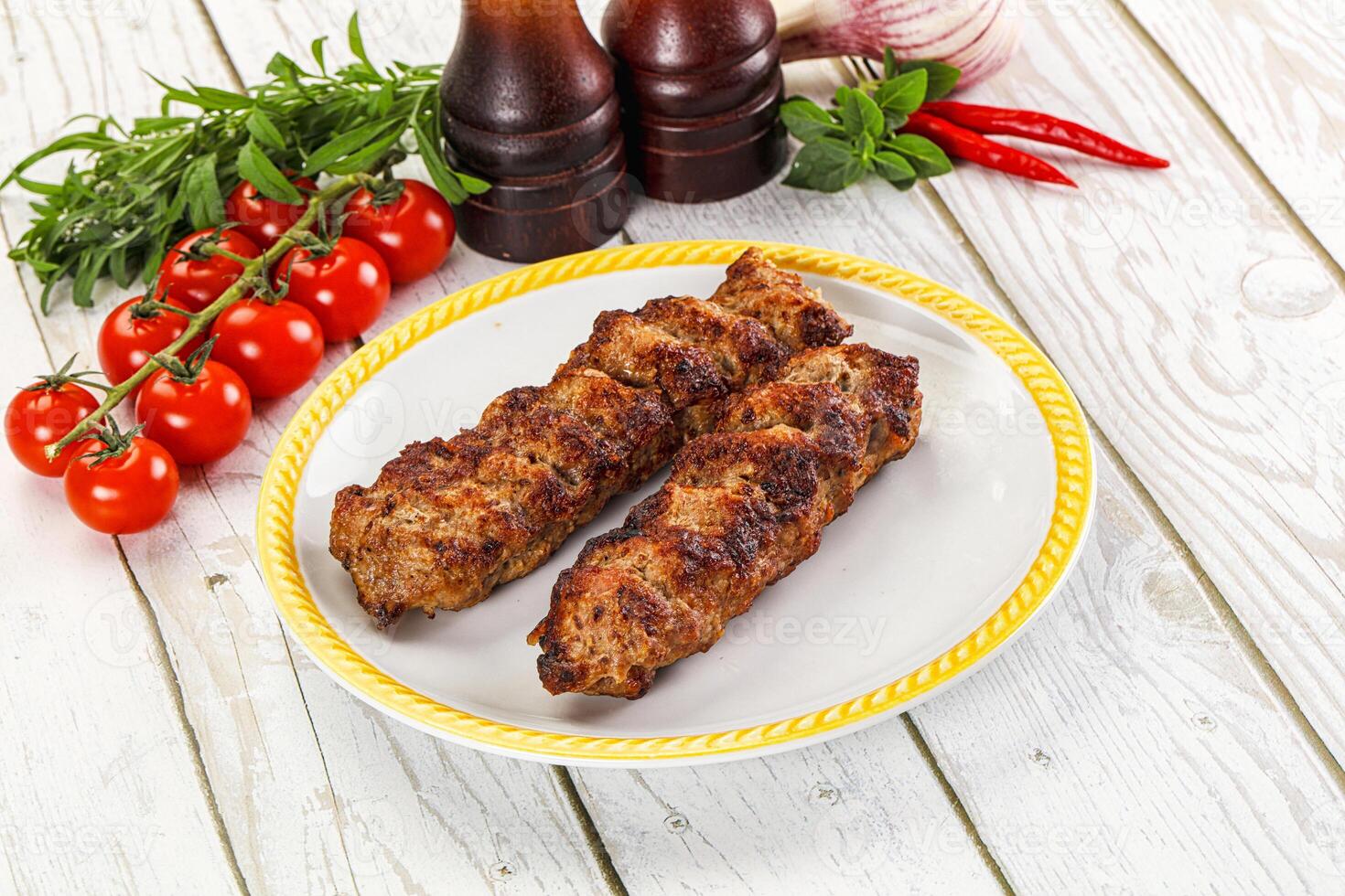 Chicken kebab minced meat and spices photo