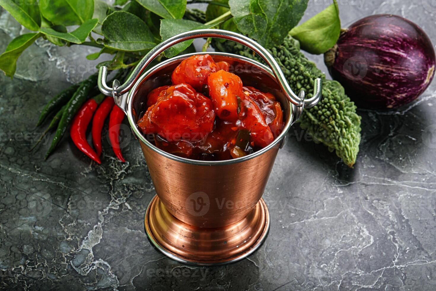 Chinese cuisine - chicken in sweet and sour sauce photo