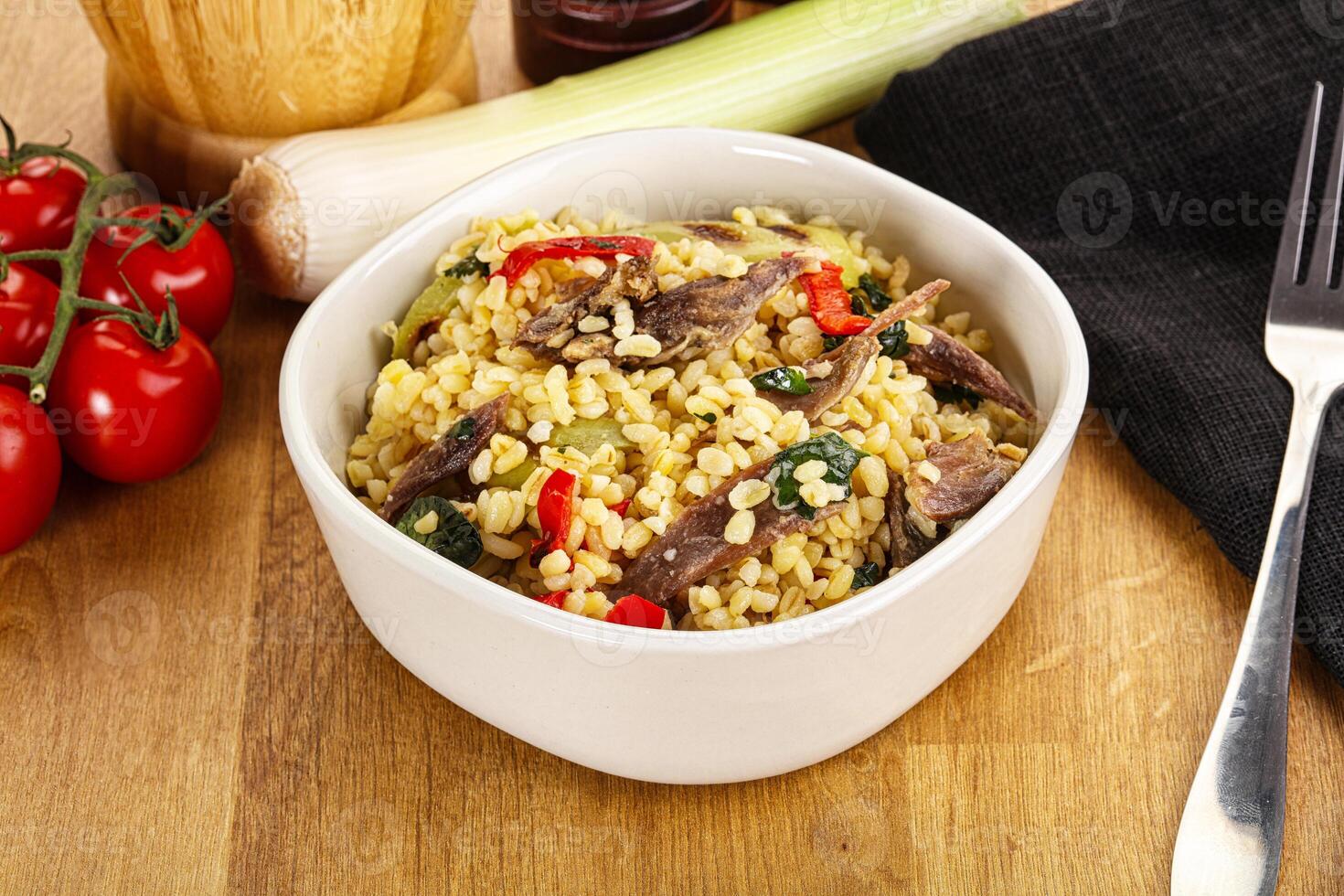 Bulgur with lamb and vegetables photo