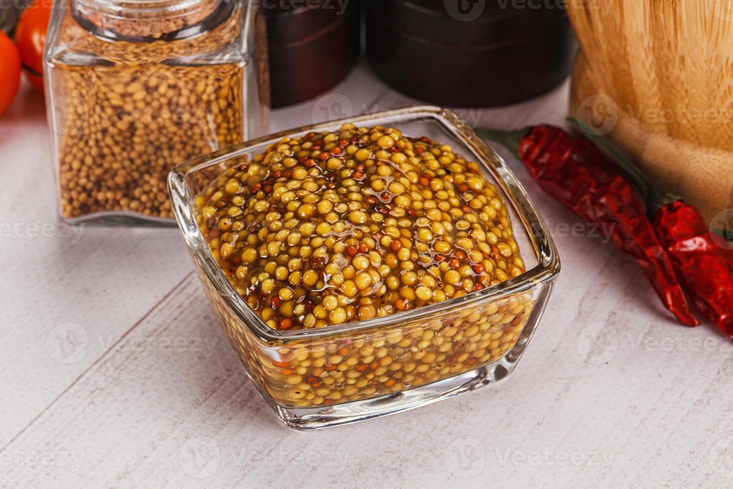 Spicy mustard sauce with seeds photo